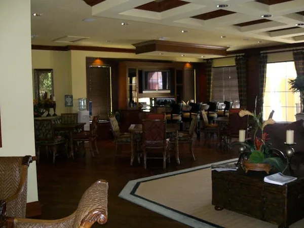 a room with lots of wooden furniture