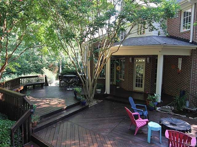 3824 White Chapel Way Raleigh, NC 27615 - Photo 23 of 25 Outdoor living at its finest! Lots of decking and wait until you see the hot tub setting.