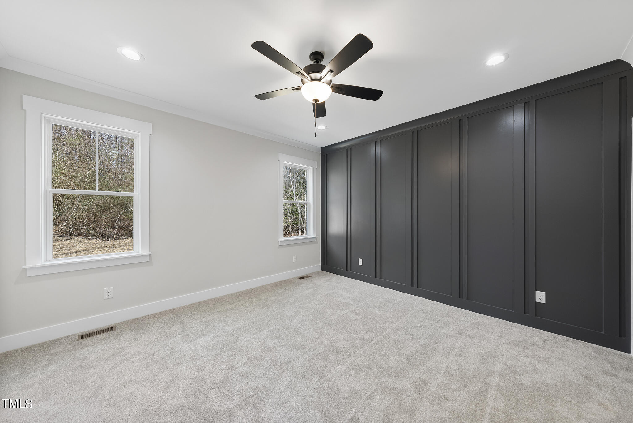 80 Pilot Ridge Road Zebulon, NC 27597 - Photo 15 of 36 a view of an empty room with a ceiling fan