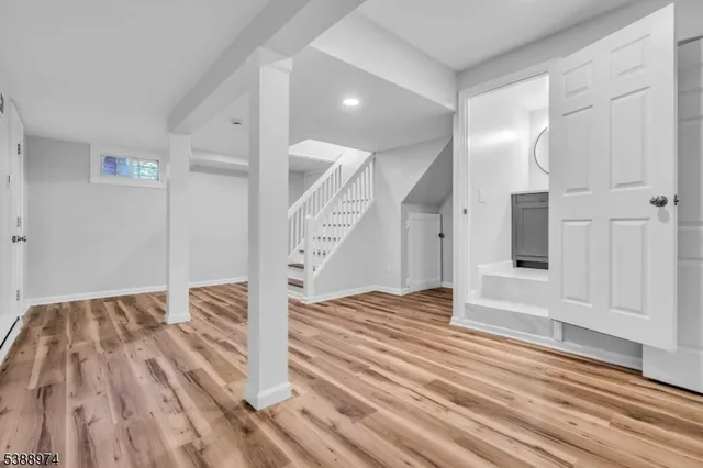 a view of entryway with wooden floor