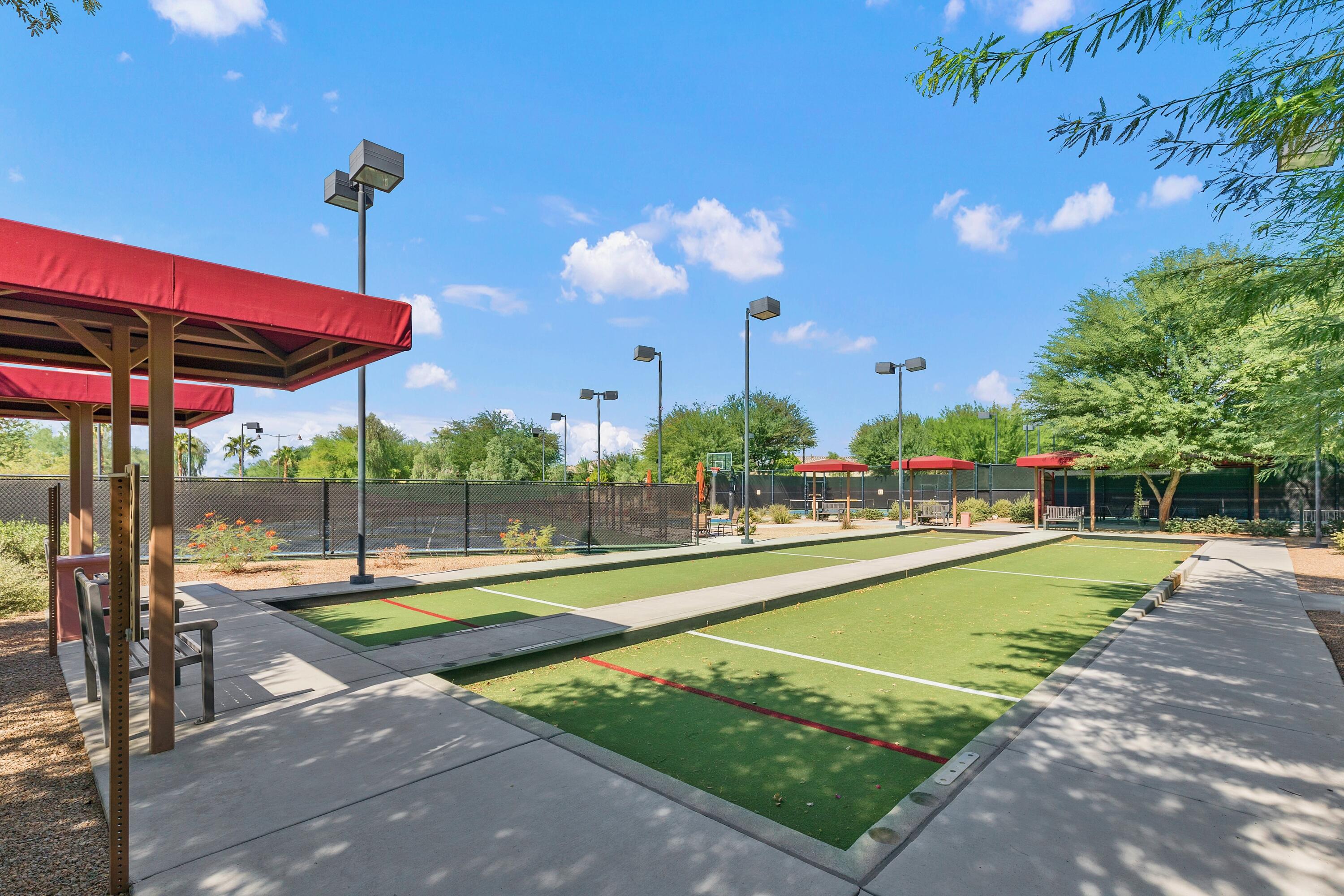 81220 Corte Tolon Indio, CA 92203 - Photo 35 of 42 a view of a swimming pool with a patio