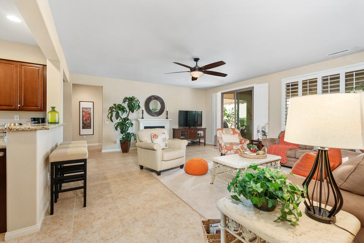 81220 Corte Tolon Indio, CA 92203 - Photo 7 of 42 a living room with furniture kitchen view and a window