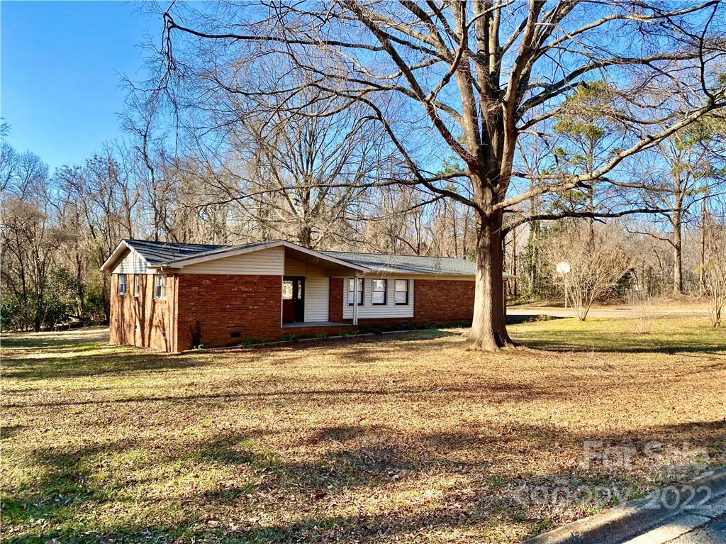 402 Brookgreen Drive Monroe, NC 28112 - Photo 2 of 26 a house that has a tree in front of it