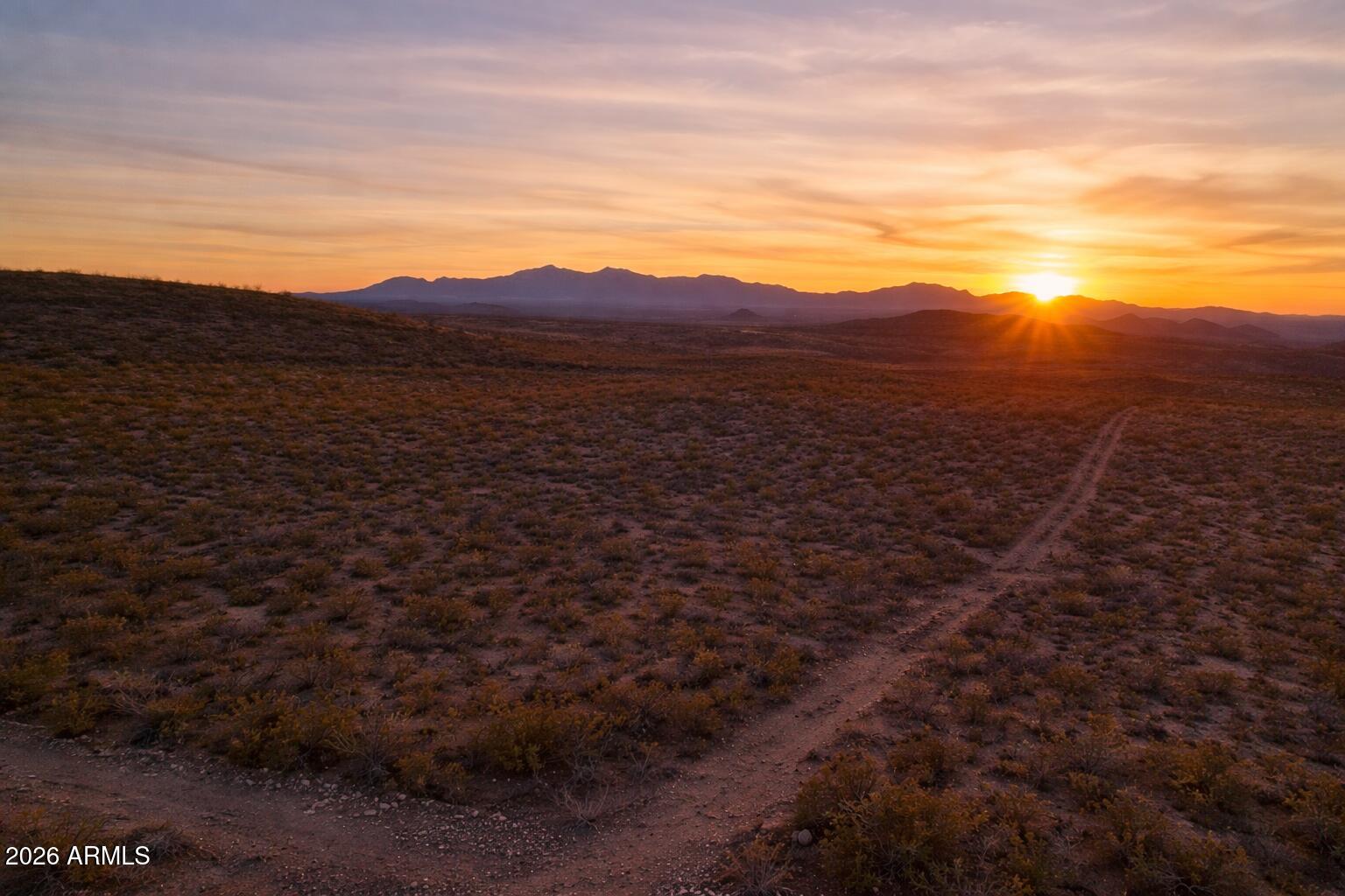 Tbd South Miners Dream Road Tombstone, AZ 85638 - Photo 17 of 23 a view of a large mountain with mountains in the background