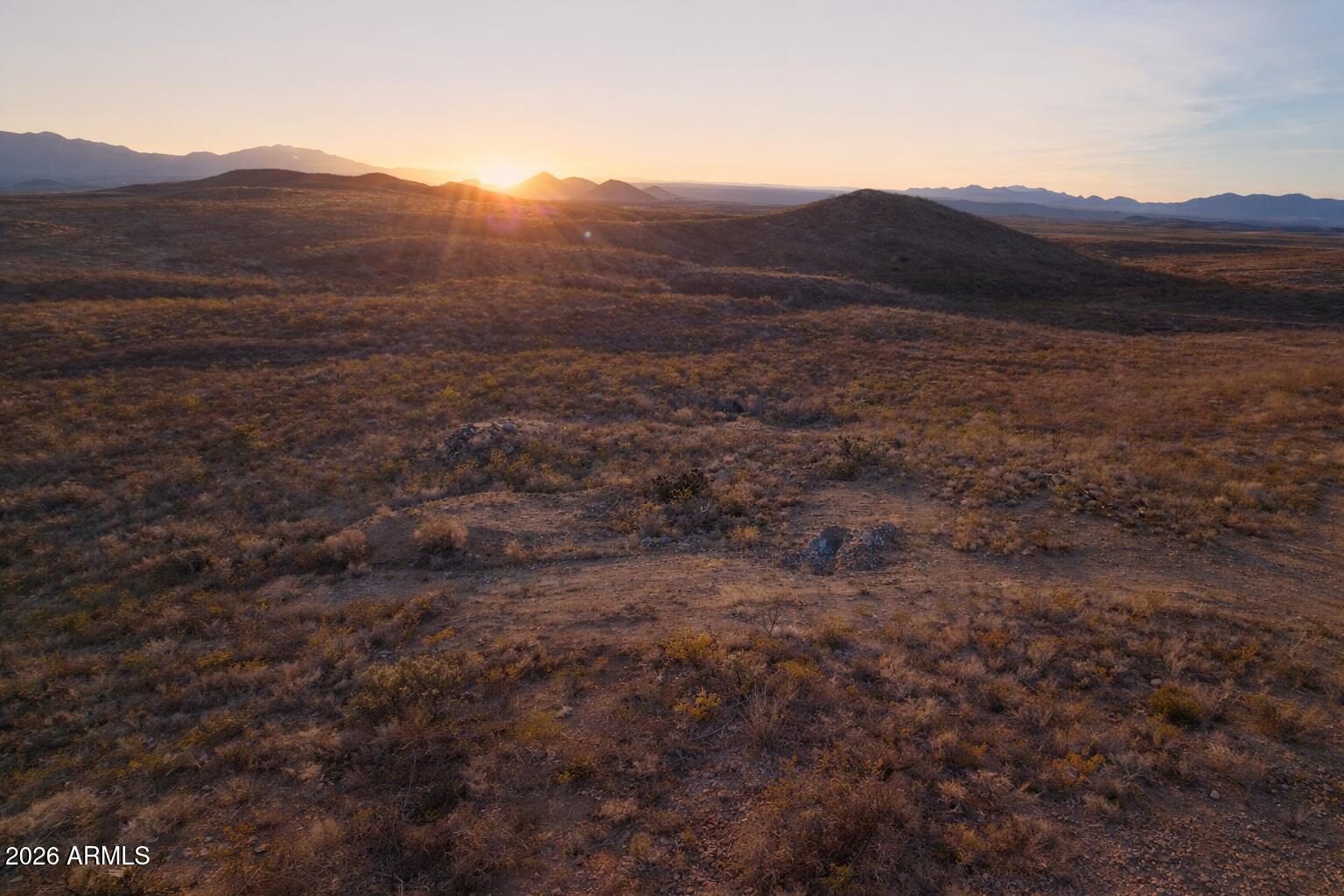 Tbd South Miners Dream Road Tombstone, AZ 85638 - Photo 7 of 23 a view of a forest with mountains in the background