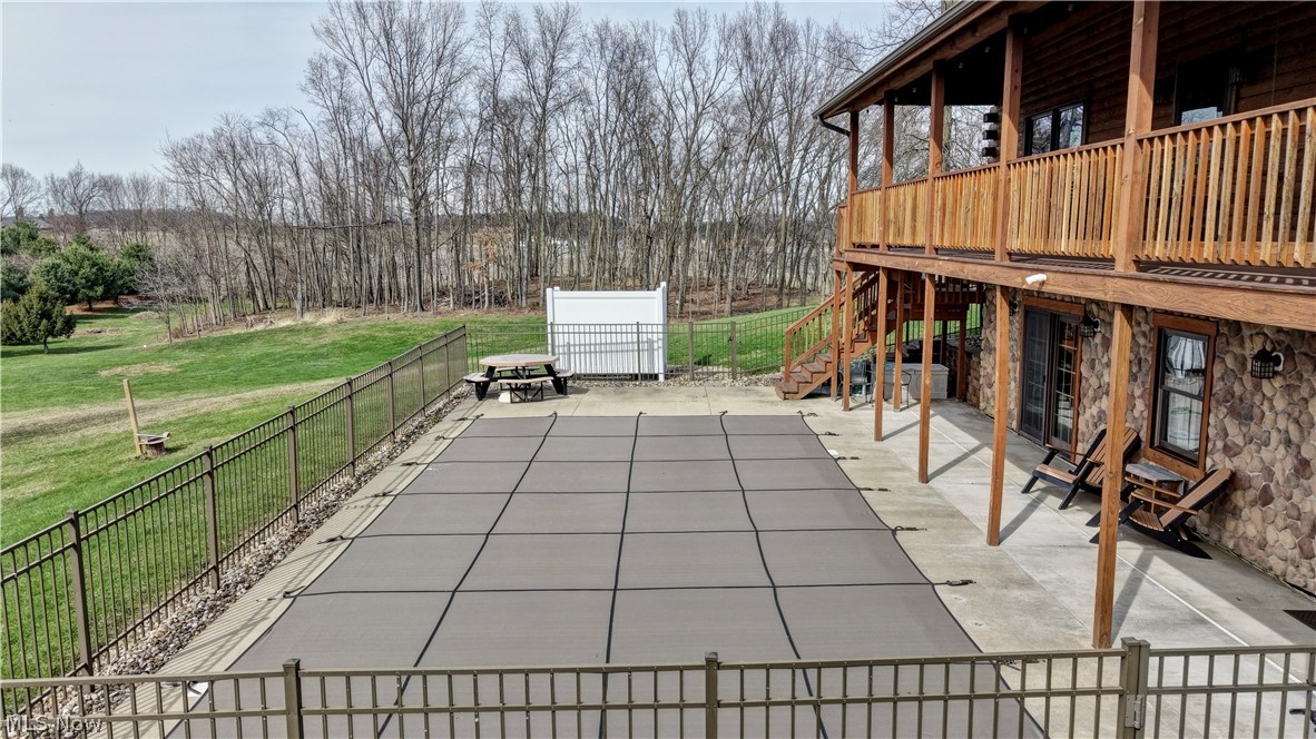8045 McFadden Road Shreve, OH 44676 - Photo 9 of 45 View of patio featuring stairway