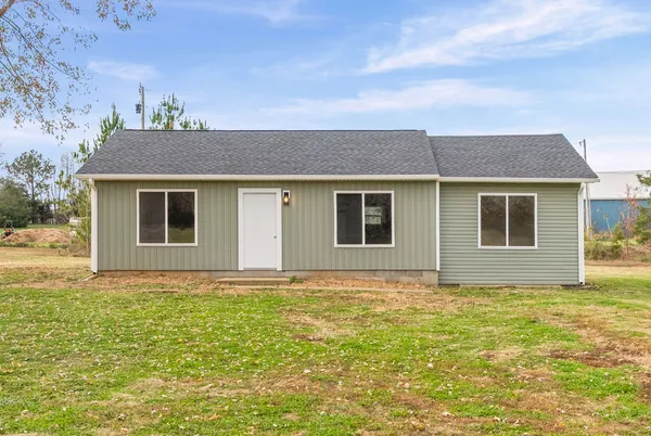 a view of front of house with yard