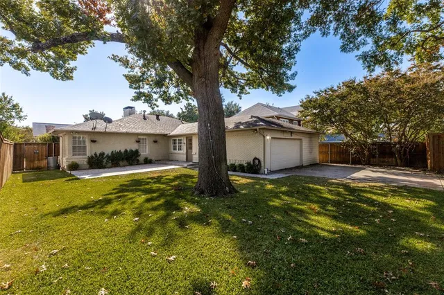 a house view with a garden space