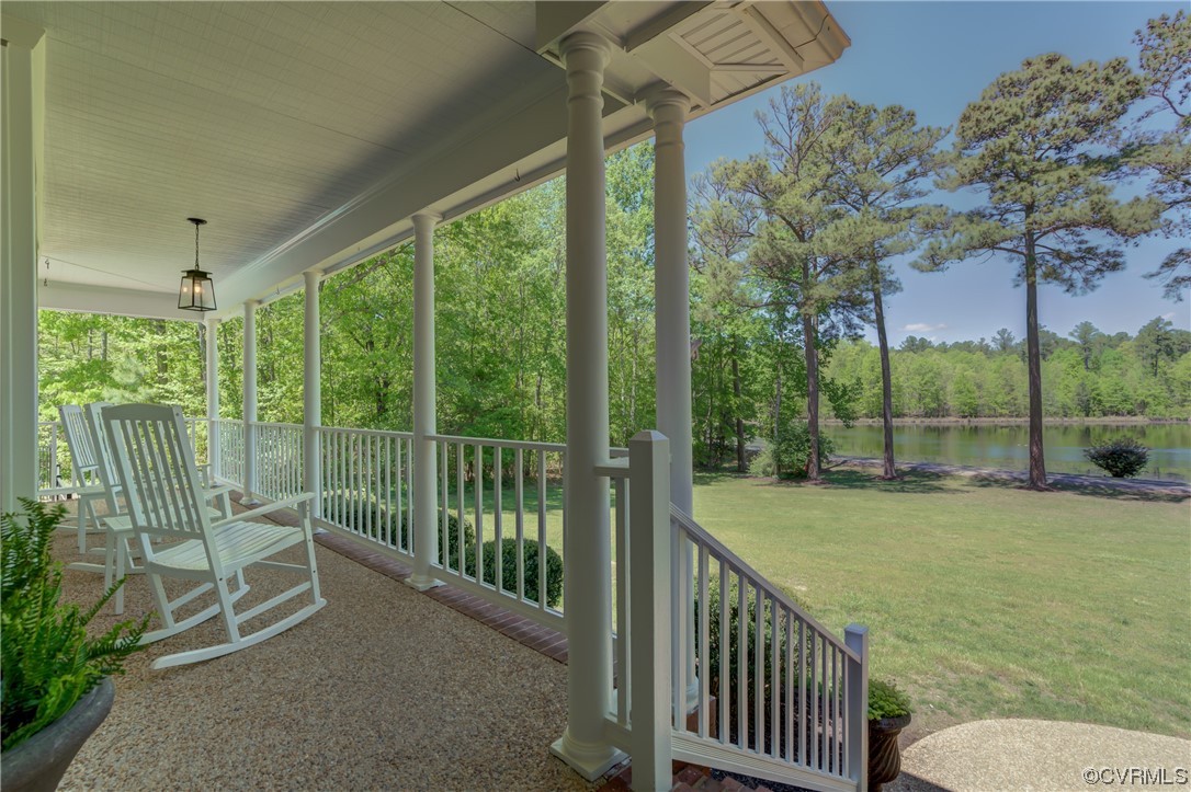 5101 Moseley Road Moseley, VA 23120 - Photo 11 of 46 a view of a chair and tables in the balcony