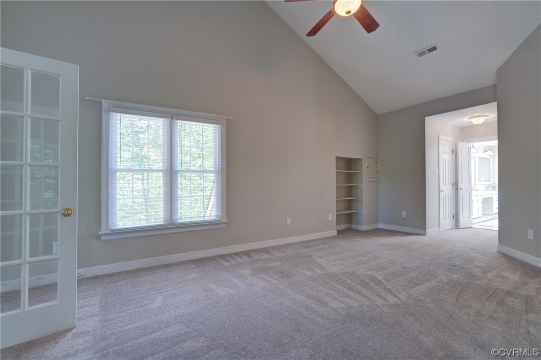 5101 Moseley Road Moseley, VA 23120 - Photo 25 of 46 an empty room with windows and fan