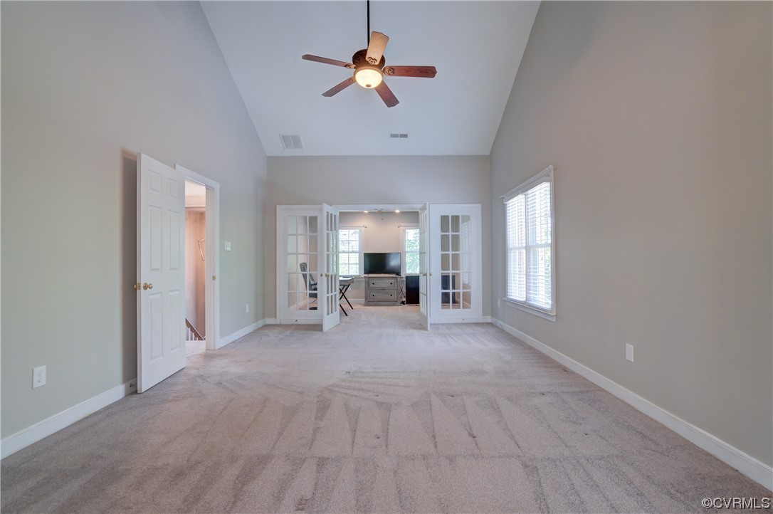 5101 Moseley Road Moseley, VA 23120 - Photo 26 of 46 a view of livingroom with furniture chandelier fan and window