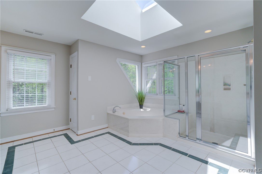 5101 Moseley Road Moseley, VA 23120 - Photo 29 of 46 a bathroom with a bathtub and shower
