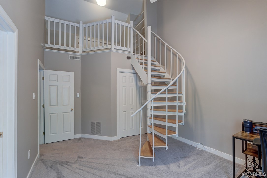 5101 Moseley Road Moseley, VA 23120 - Photo 33 of 46 a view of an empty room with stairs and a window