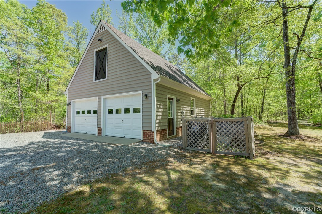 5101 Moseley Road Moseley, VA 23120 - Photo 37 of 46 a view of a house with a yard