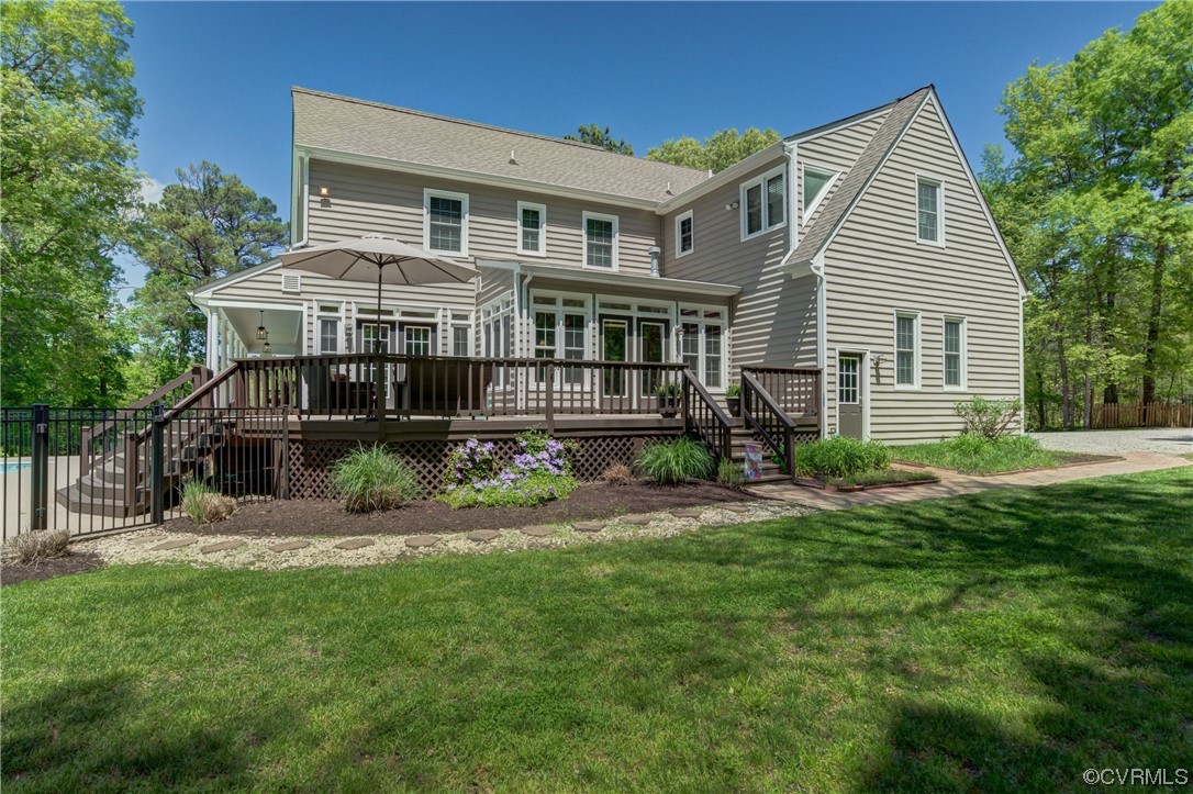 5101 Moseley Road Moseley, VA 23120 - Photo 39 of 46 a front view of a house with a yard and potted plants