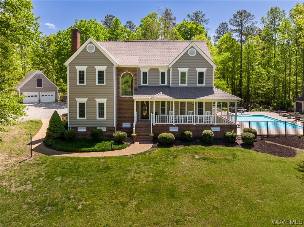 5101 Moseley Road Moseley, VA 23120 - Photo 4 of 46 a front view of a house with garden