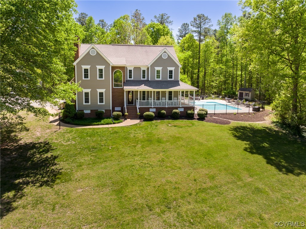 5101 Moseley Road Moseley, VA 23120 - Photo 7 of 46 a front view of a house with garden
