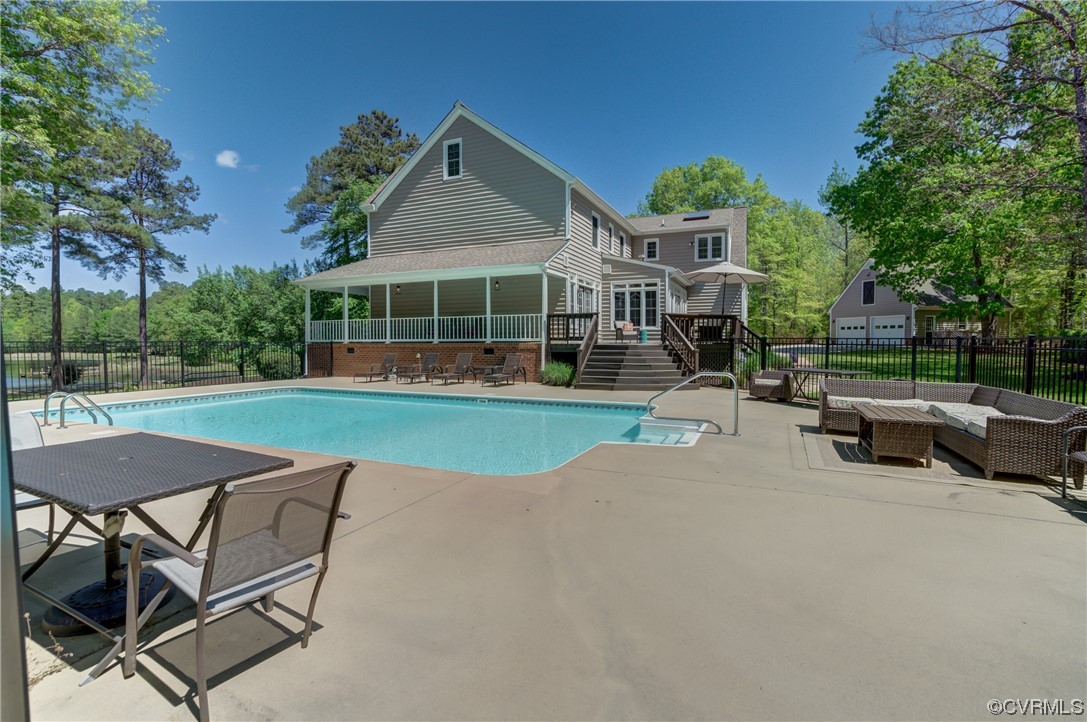 5101 Moseley Road Moseley, VA 23120 - Photo 9 of 46 a view of a house with a yard and sitting area