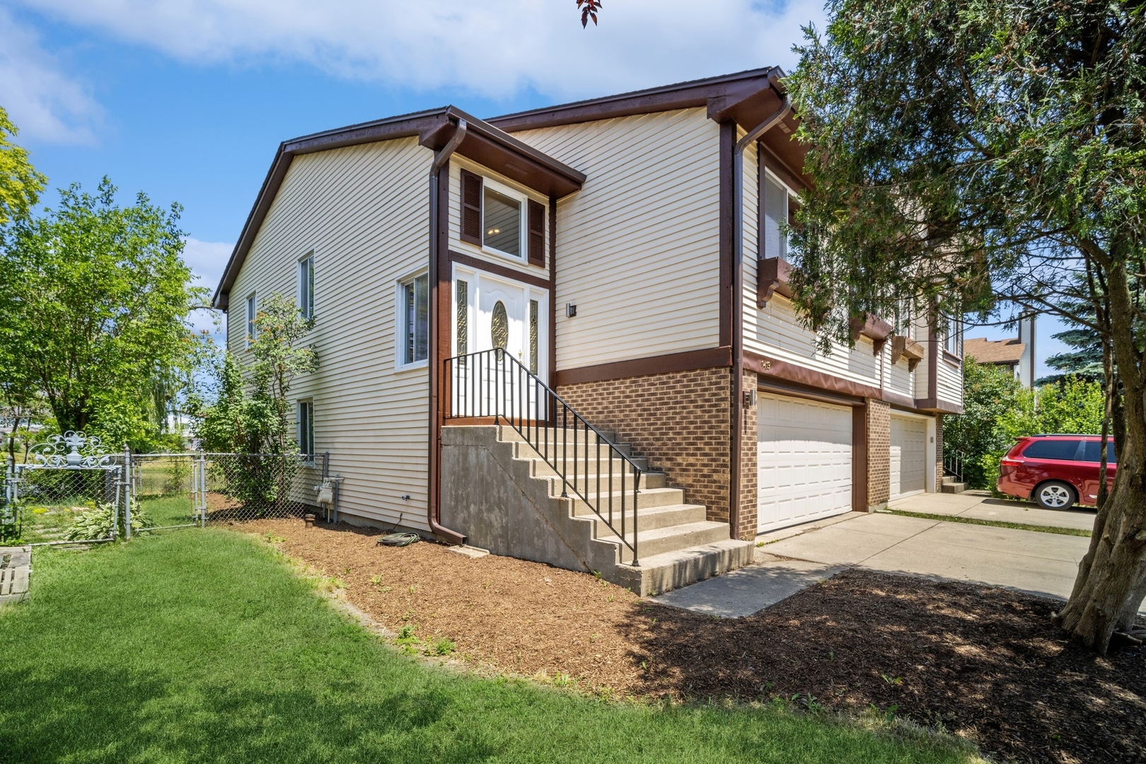 1419 Chippewa Trail Wheeling, IL 60090 - Photo 2 of 13 a house view with a outdoor space