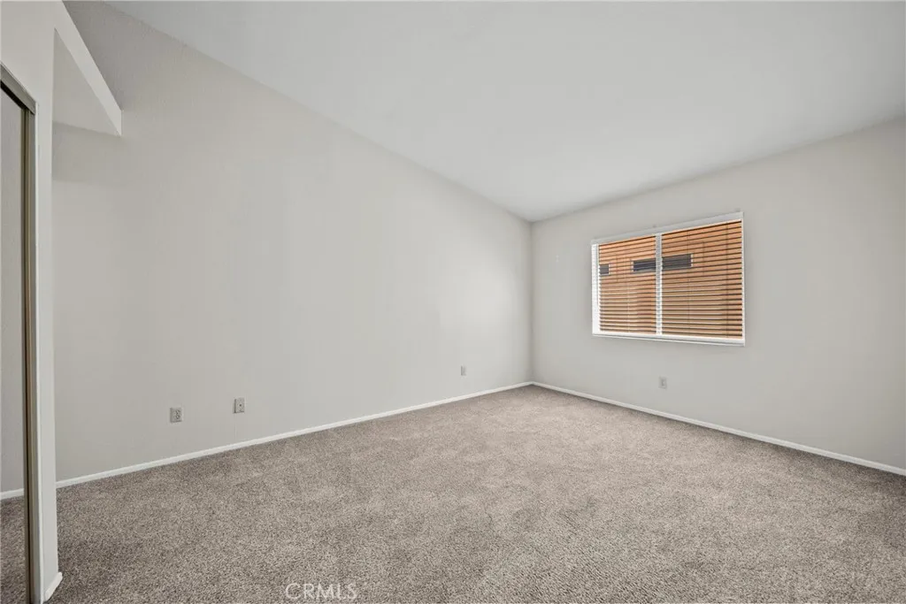 25118 Steinbeck Avenue Stevenson Ranch, CA 91381 - Photo 23 of 34 an empty room with windows