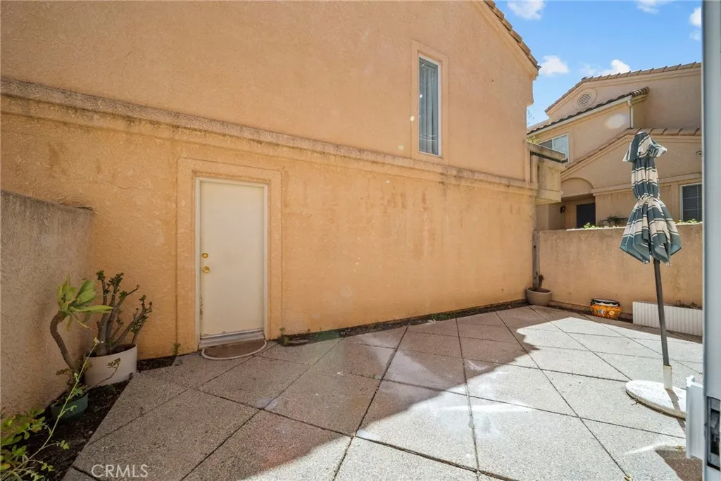 25118 Steinbeck Avenue Stevenson Ranch, CA 91381 - Photo 24 of 34 a view of a entryway