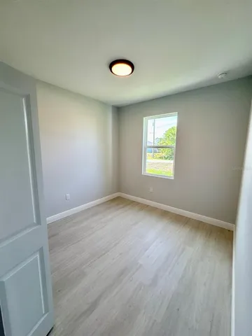 an empty room with window