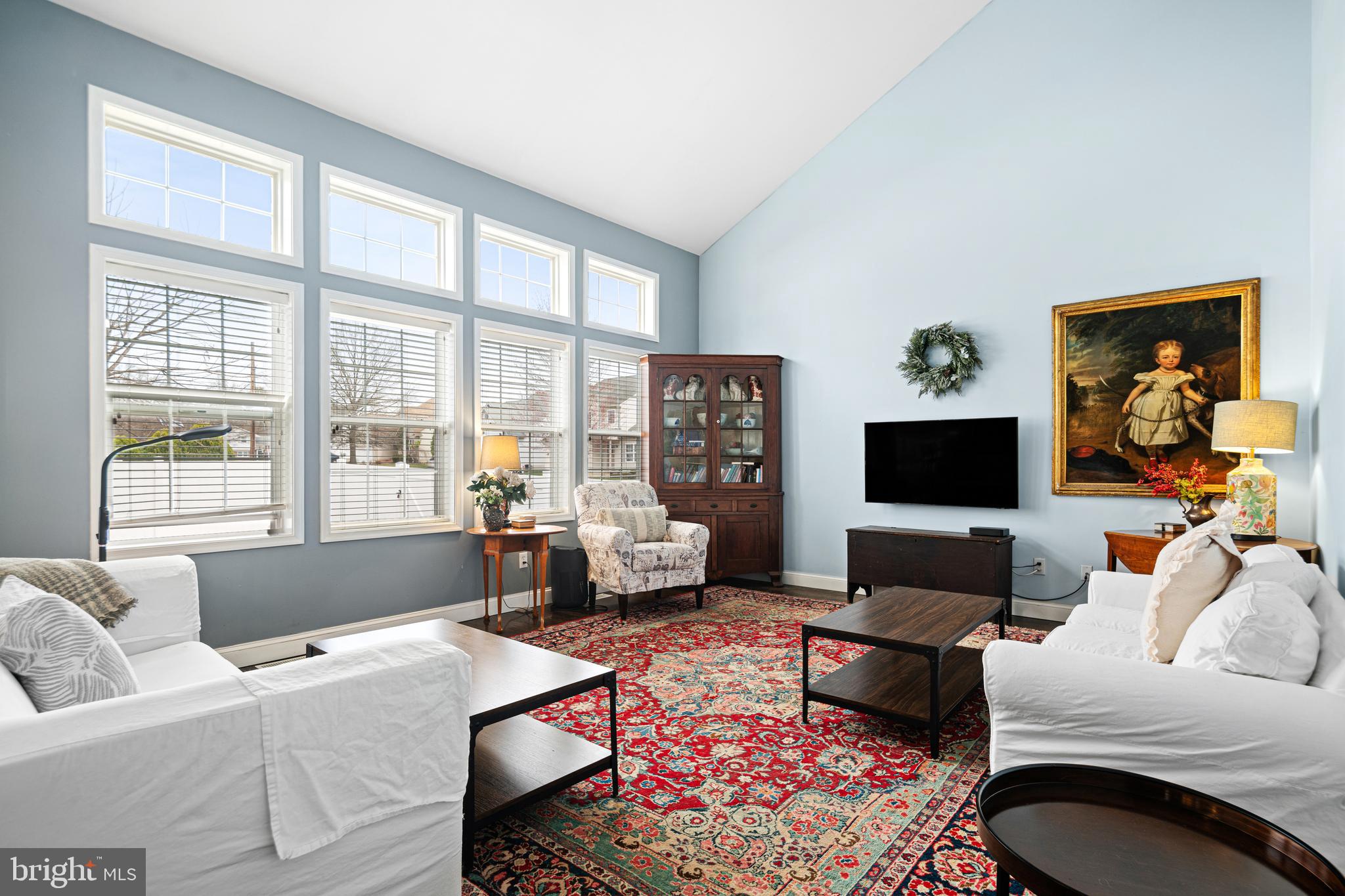 52 River Run Lawnside, NJ 08045 - Photo 14 of 49 a living room with furniture a rug and a flat screen tv