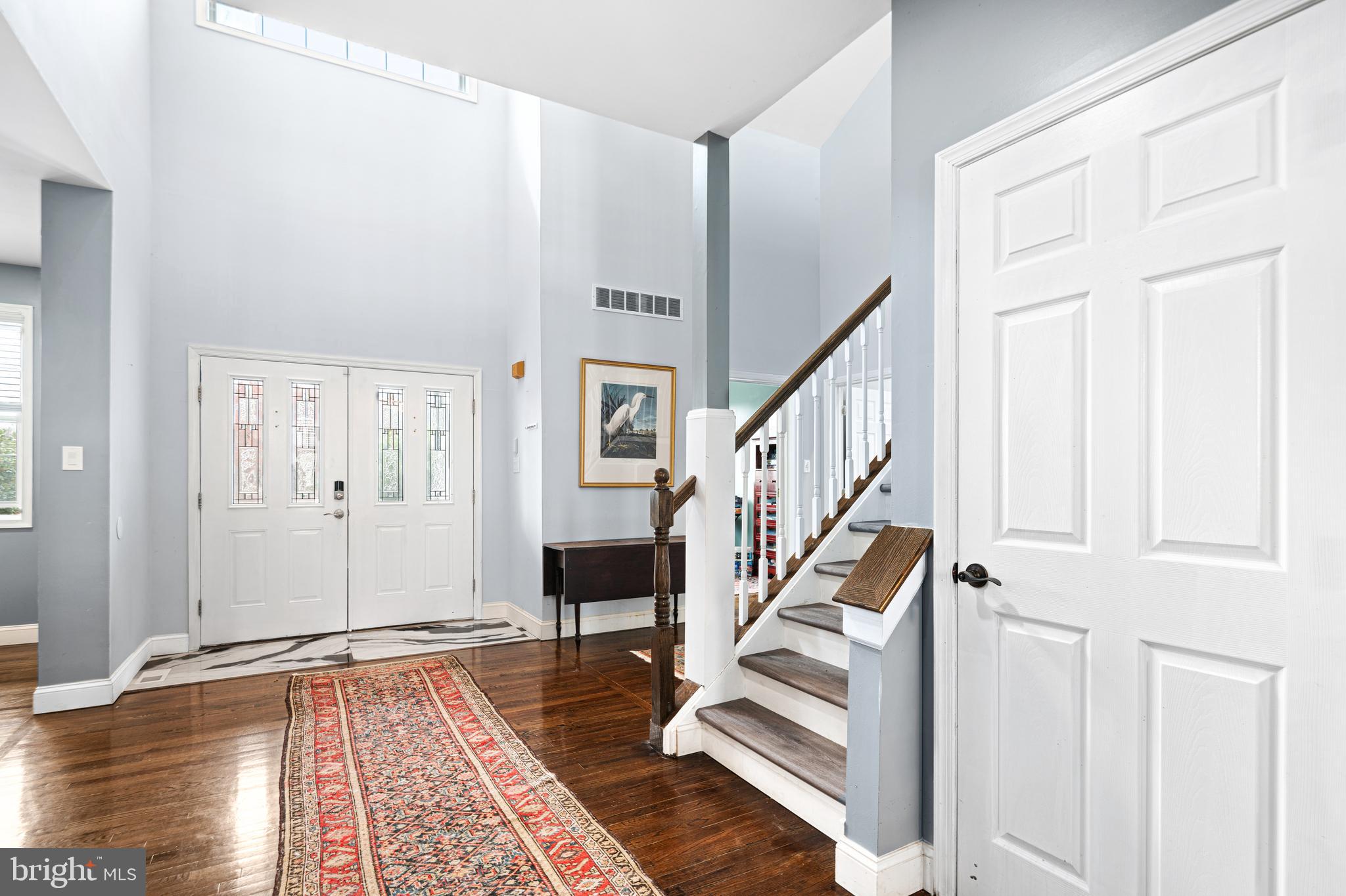 52 River Run Lawnside, NJ 08045 - Photo 15 of 49 a view of entryway with wooden floor and stair