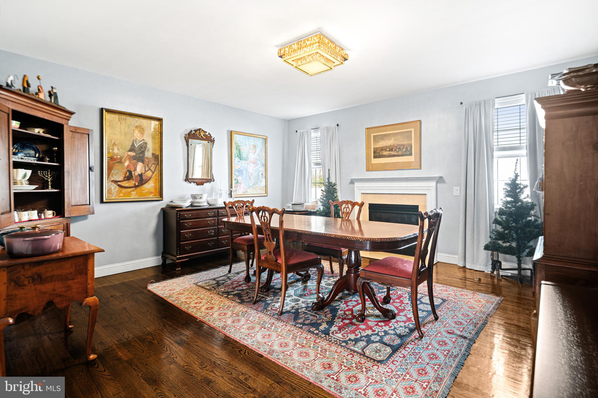 52 River Run Lawnside, NJ 08045 - Photo 20 of 49 a living room with furniture a rug and a bookshelf