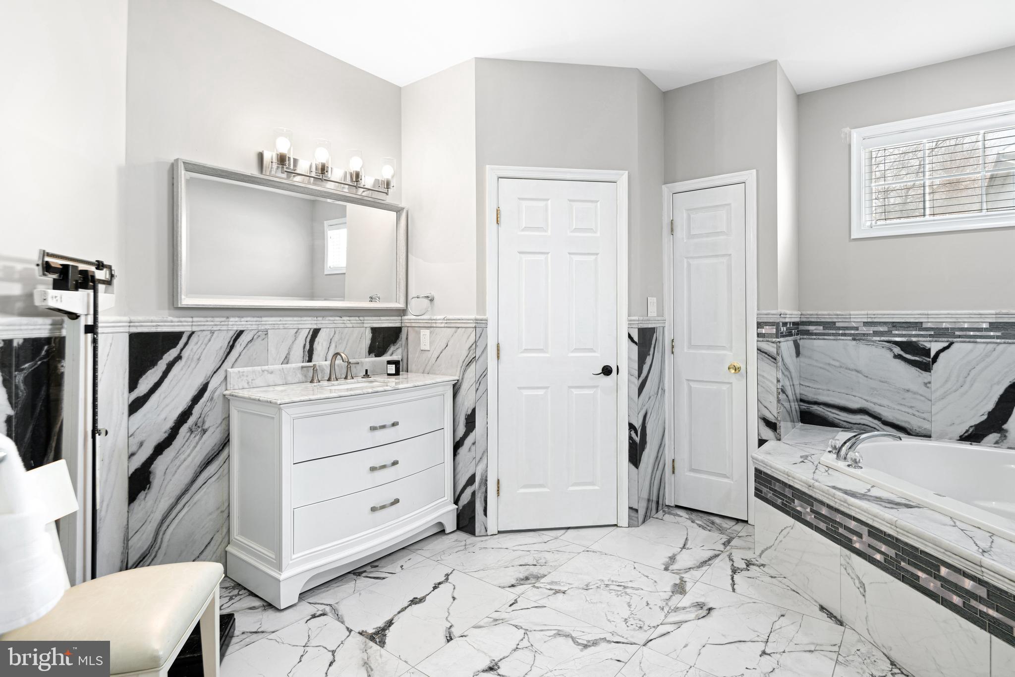 52 River Run Lawnside, NJ 08045 - Photo 24 of 49 a room with a baby bed a couch and dresser