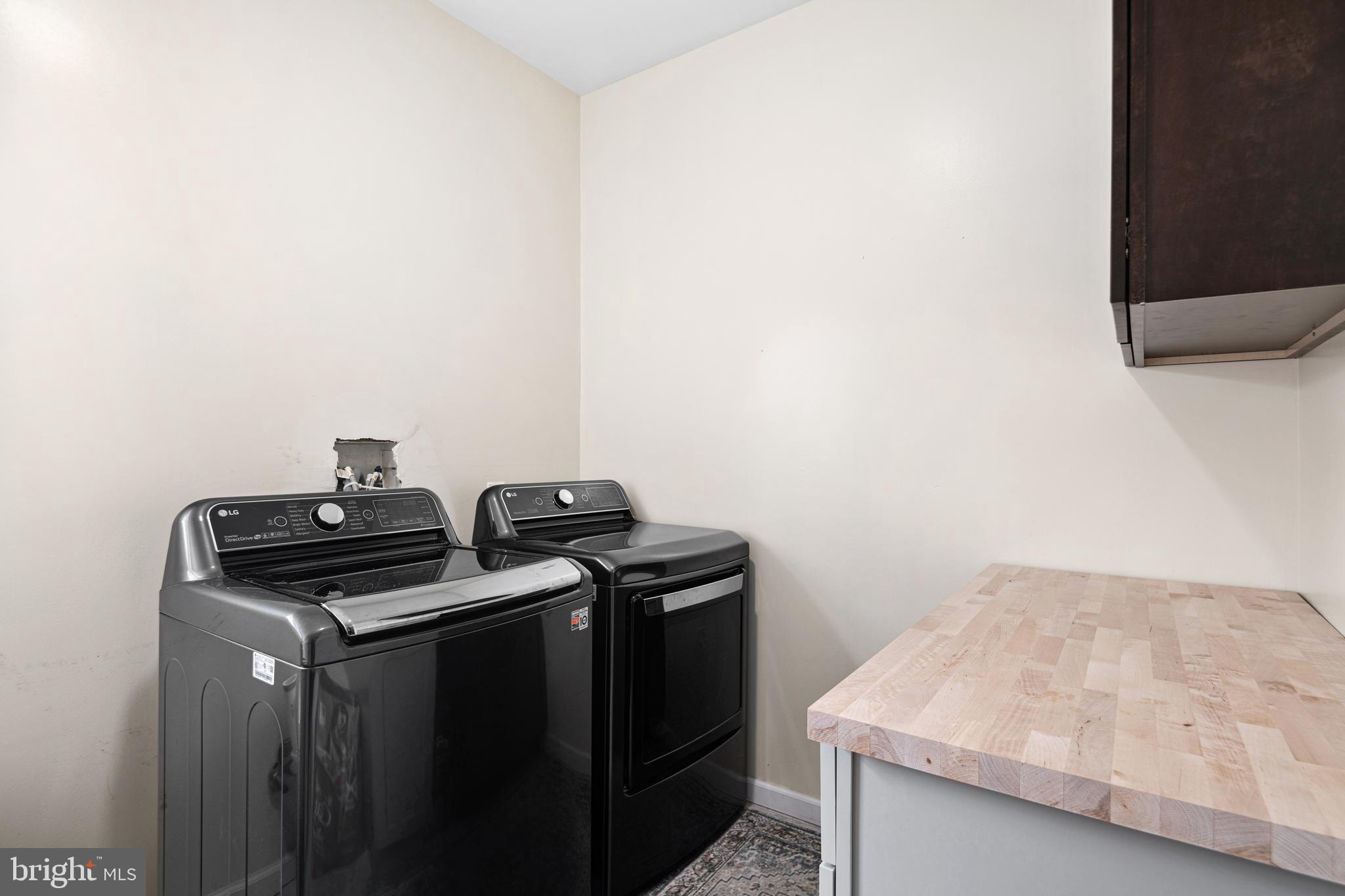 52 River Run Lawnside, NJ 08045 - Photo 27 of 49 a kitchen with a stove and a microwave