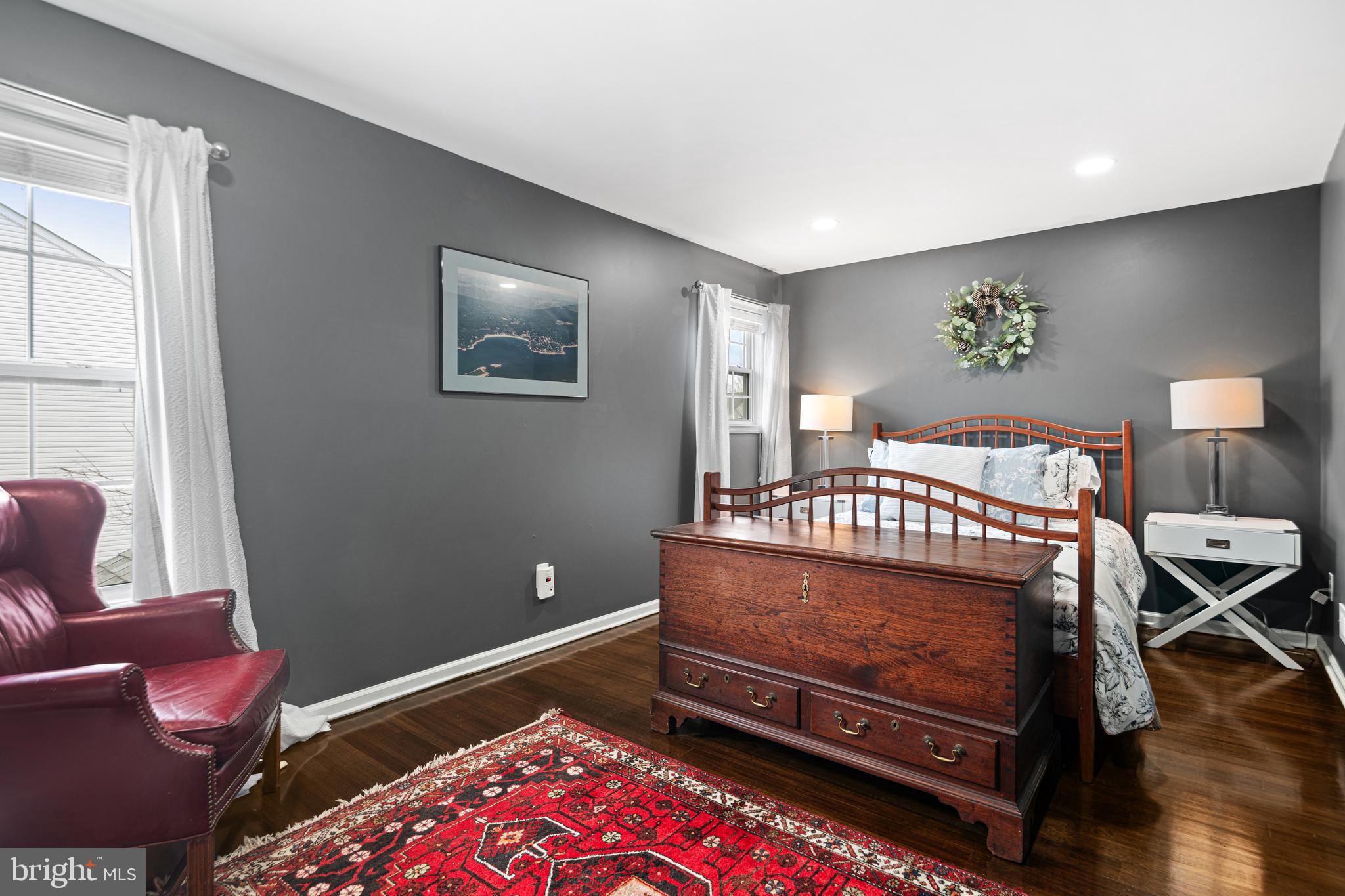 52 River Run Lawnside, NJ 08045 - Photo 30 of 49 a bedroom with a bed and wooden floor