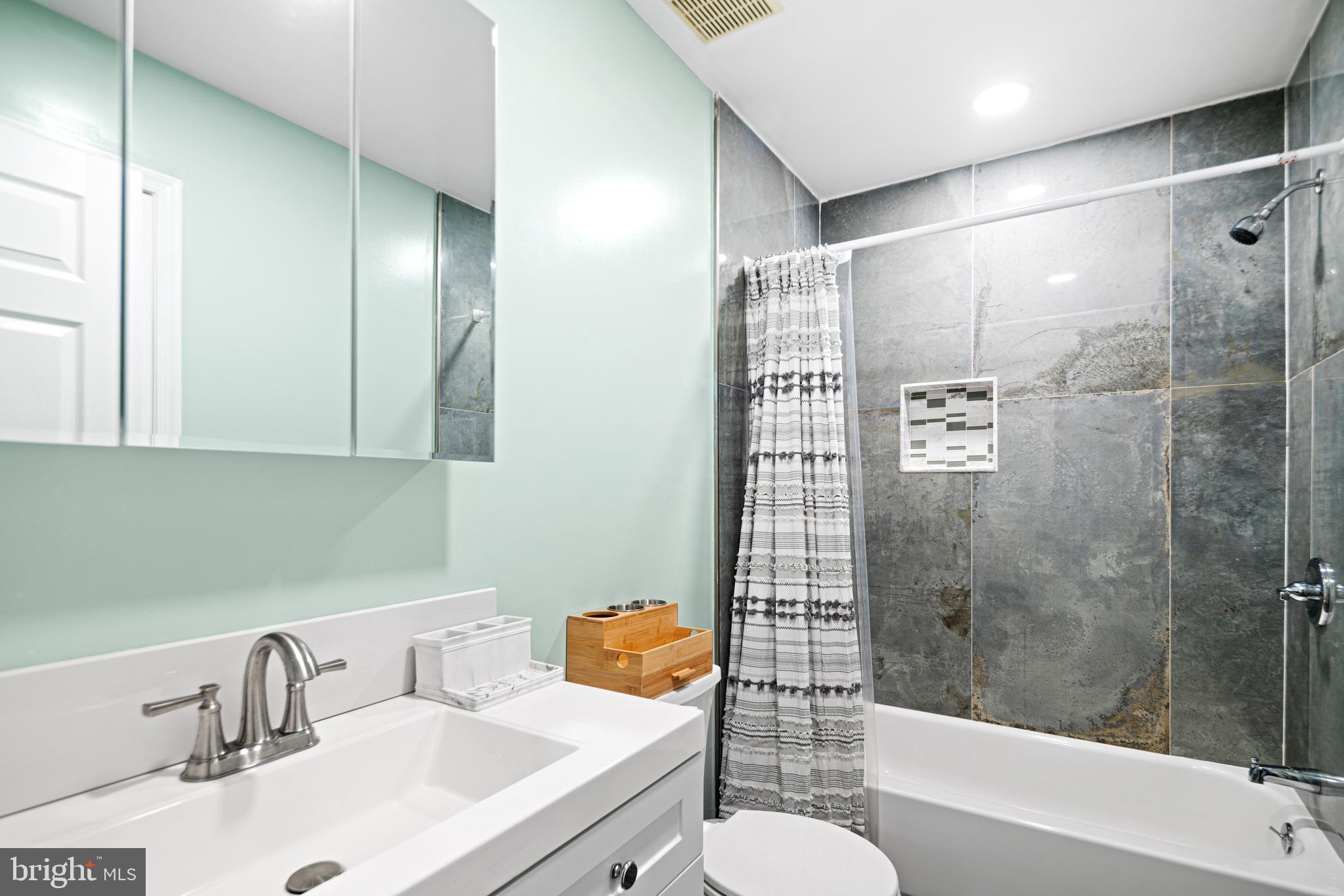 52 River Run Lawnside, NJ 08045 - Photo 32 of 49 a bathroom with a sink toilet and shower