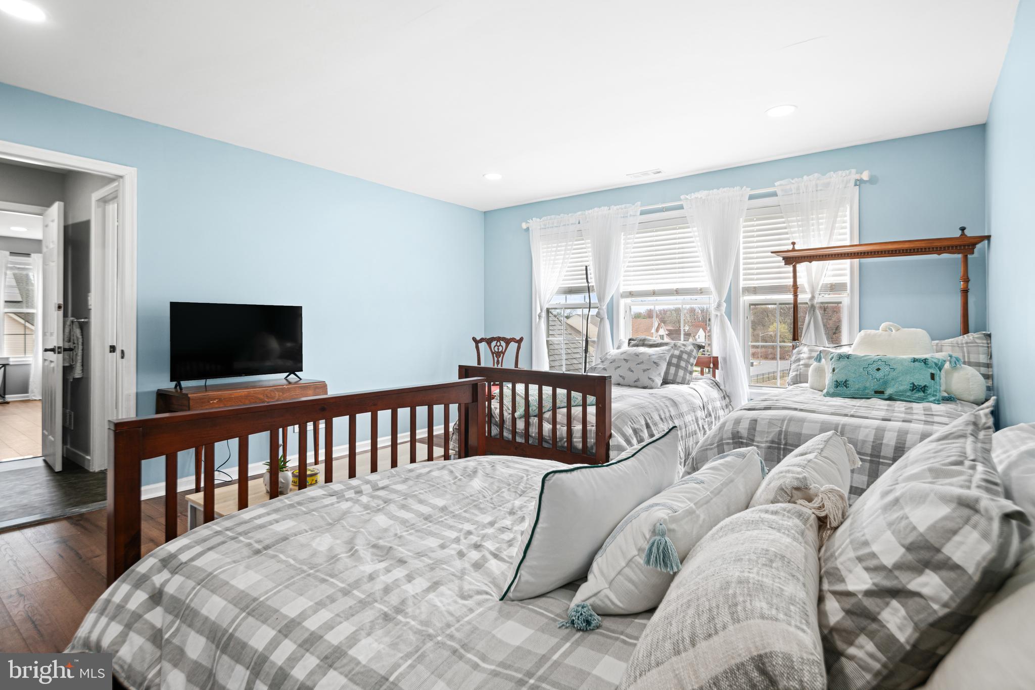 52 River Run Lawnside, NJ 08045 - Photo 33 of 49 a bed sitting in a bedroom next to a window