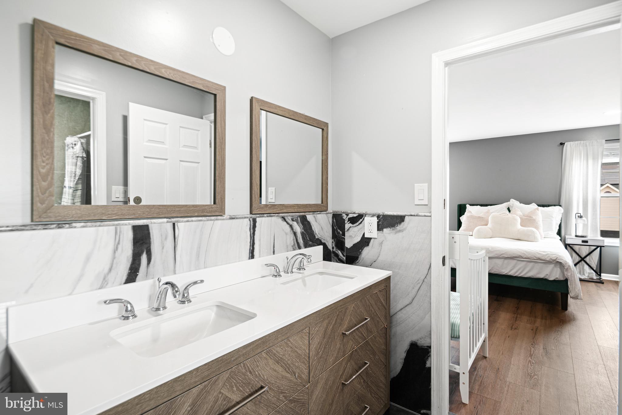 52 River Run Lawnside, NJ 08045 - Photo 38 of 49 a en suite bathroom with sink and mirror