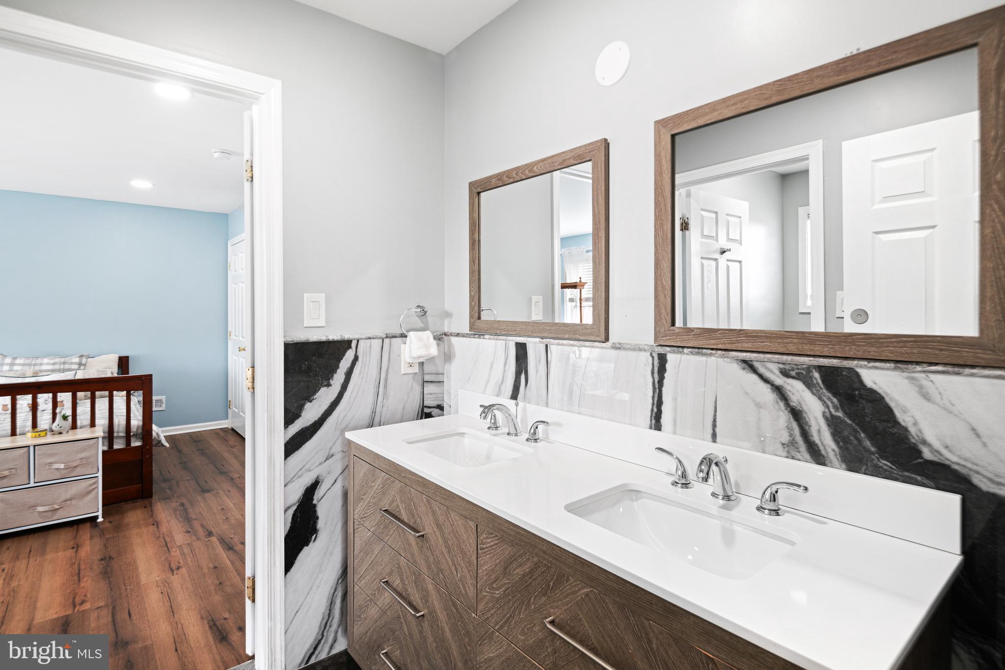 52 River Run Lawnside, NJ 08045 - Photo 39 of 49 a en suite bathroom with a double vanity sink and a mirror