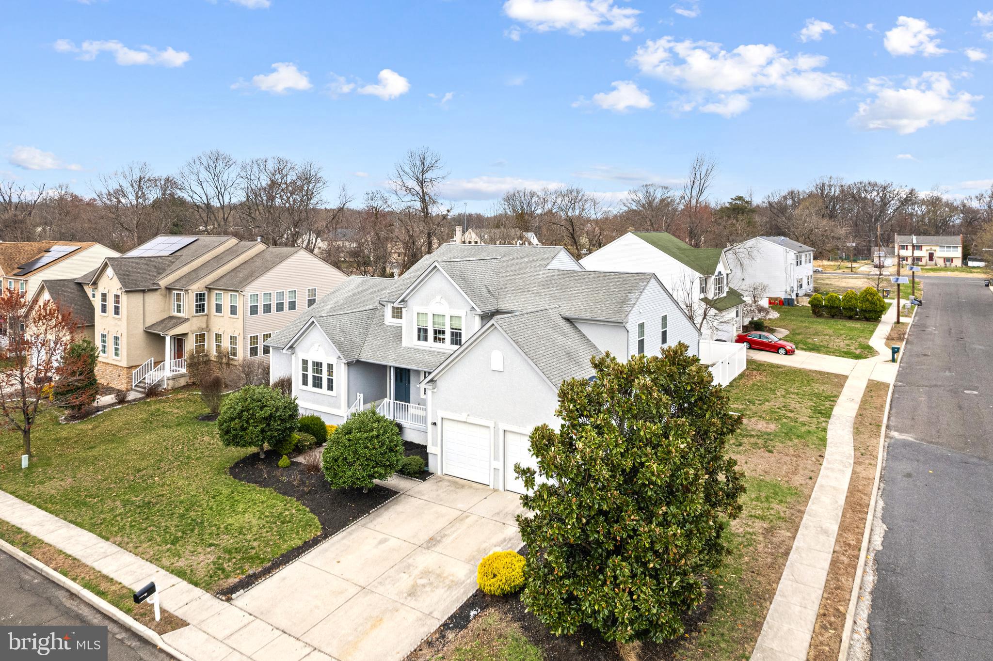 52 River Run Lawnside, NJ 08045 - Photo 44 of 49 a view of a white house with a big yard plants and large tree