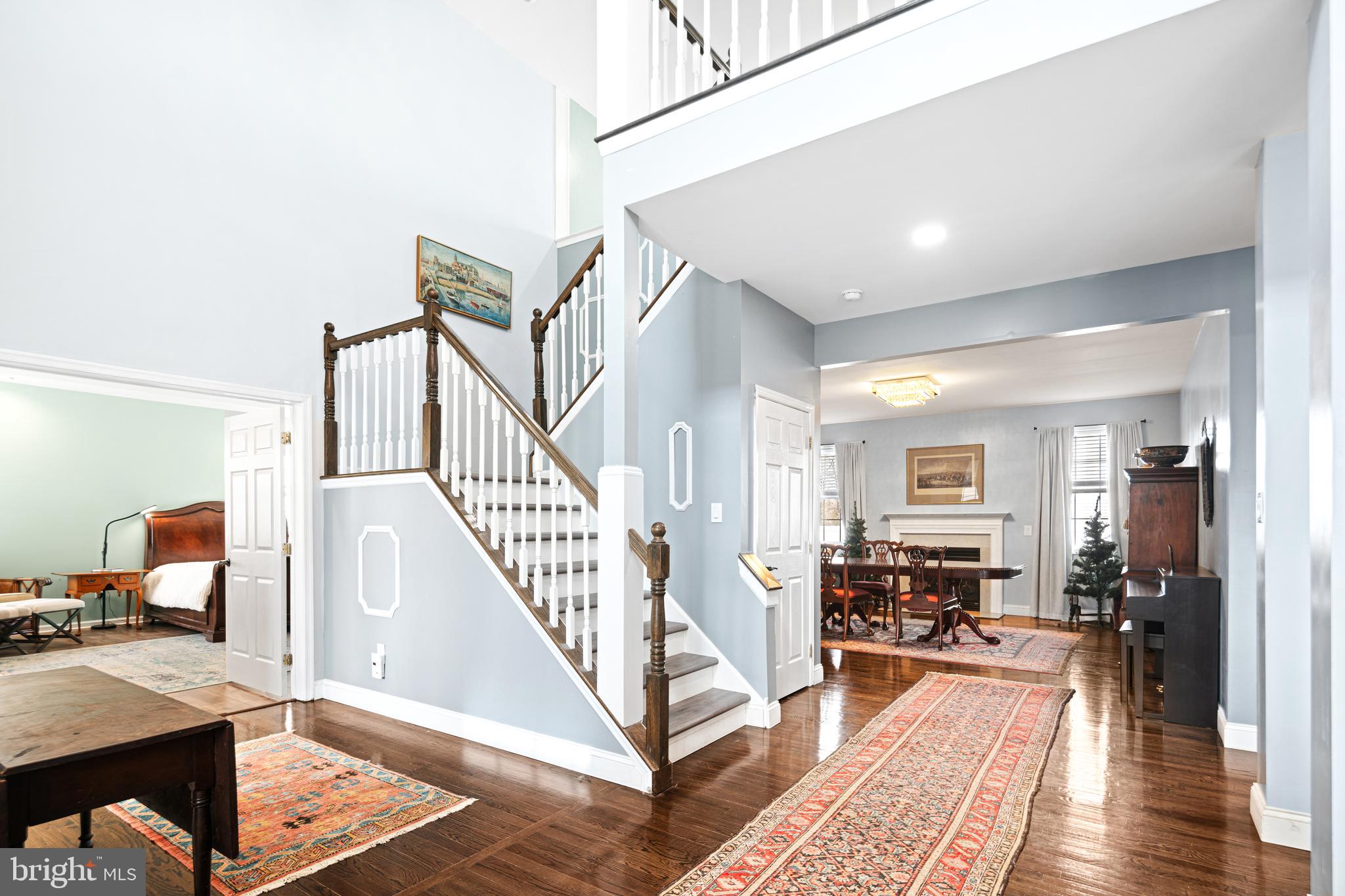 52 River Run Lawnside, NJ 08045 - Photo 6 of 49 a view of a livingroom with furniture a rug wooden floor and windows