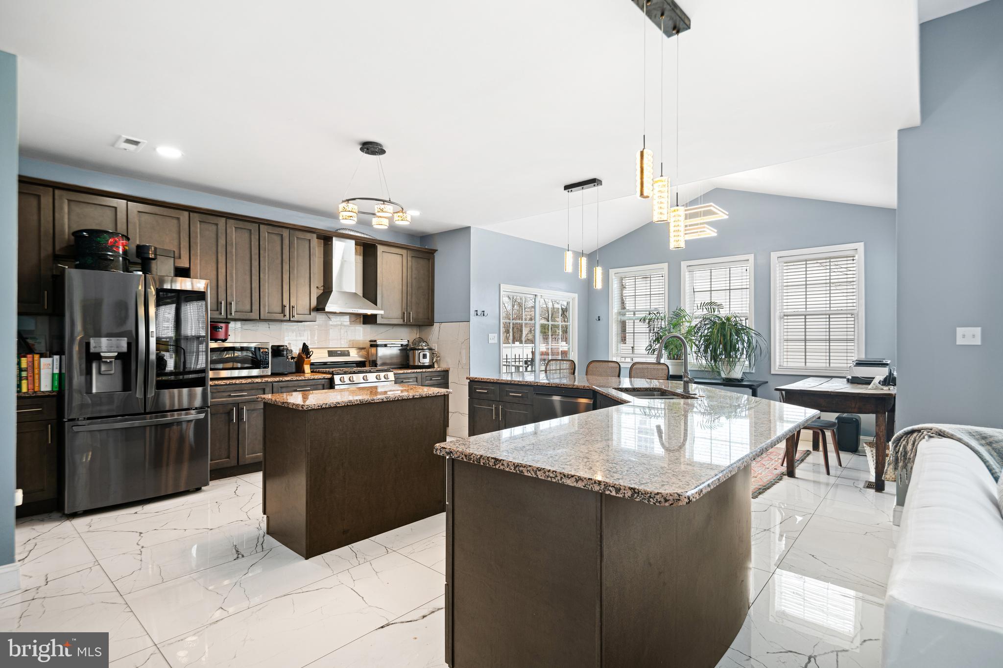 52 River Run Lawnside, NJ 08045 - Photo 8 of 49 a kitchen with stainless steel appliances granite countertop a refrigerator a sink a stove and a refrigerator