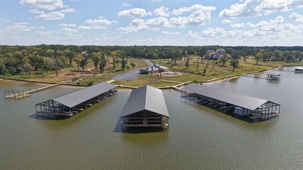 6995 Lakeshore Way Eustace, TX 75124 - Photo 12 of 14 a view of a lake with a nearby beach