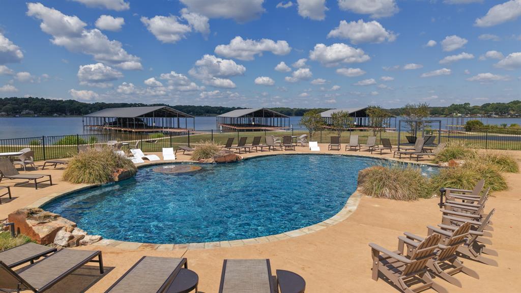 6995 Lakeshore Way Eustace, TX 75124 - Photo 6 of 14 a view of a lake with a big yard