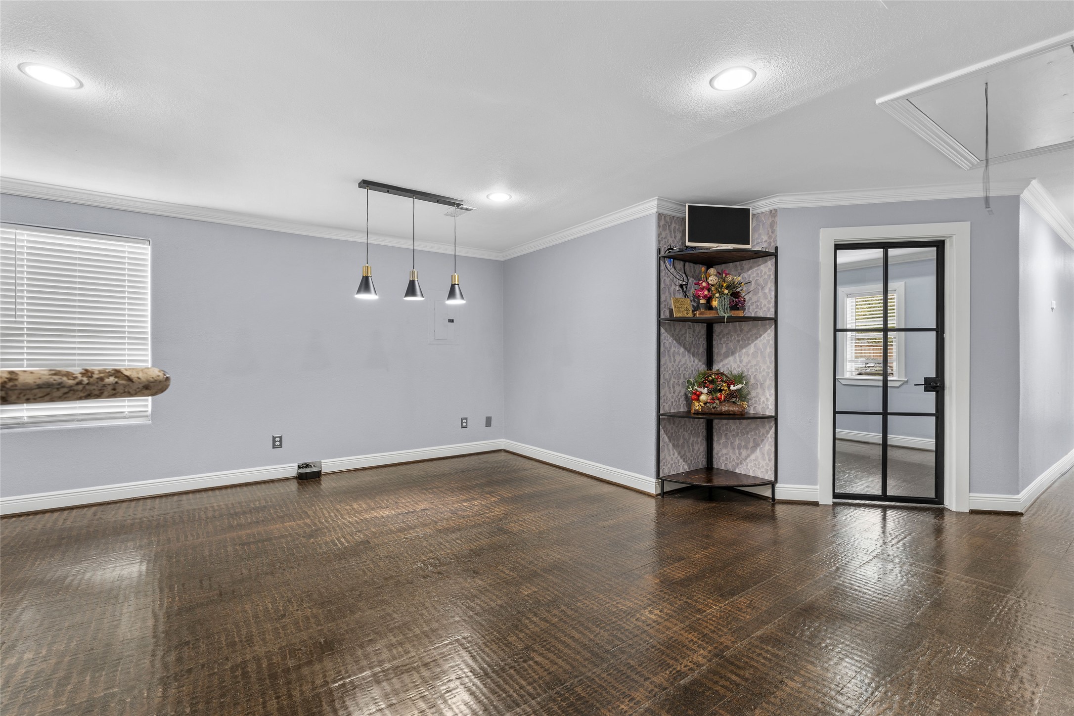 1022 Brooks Avenue Rosenberg, TX 77471 - Photo 17 of 36 wooden floor in an empty room with a window