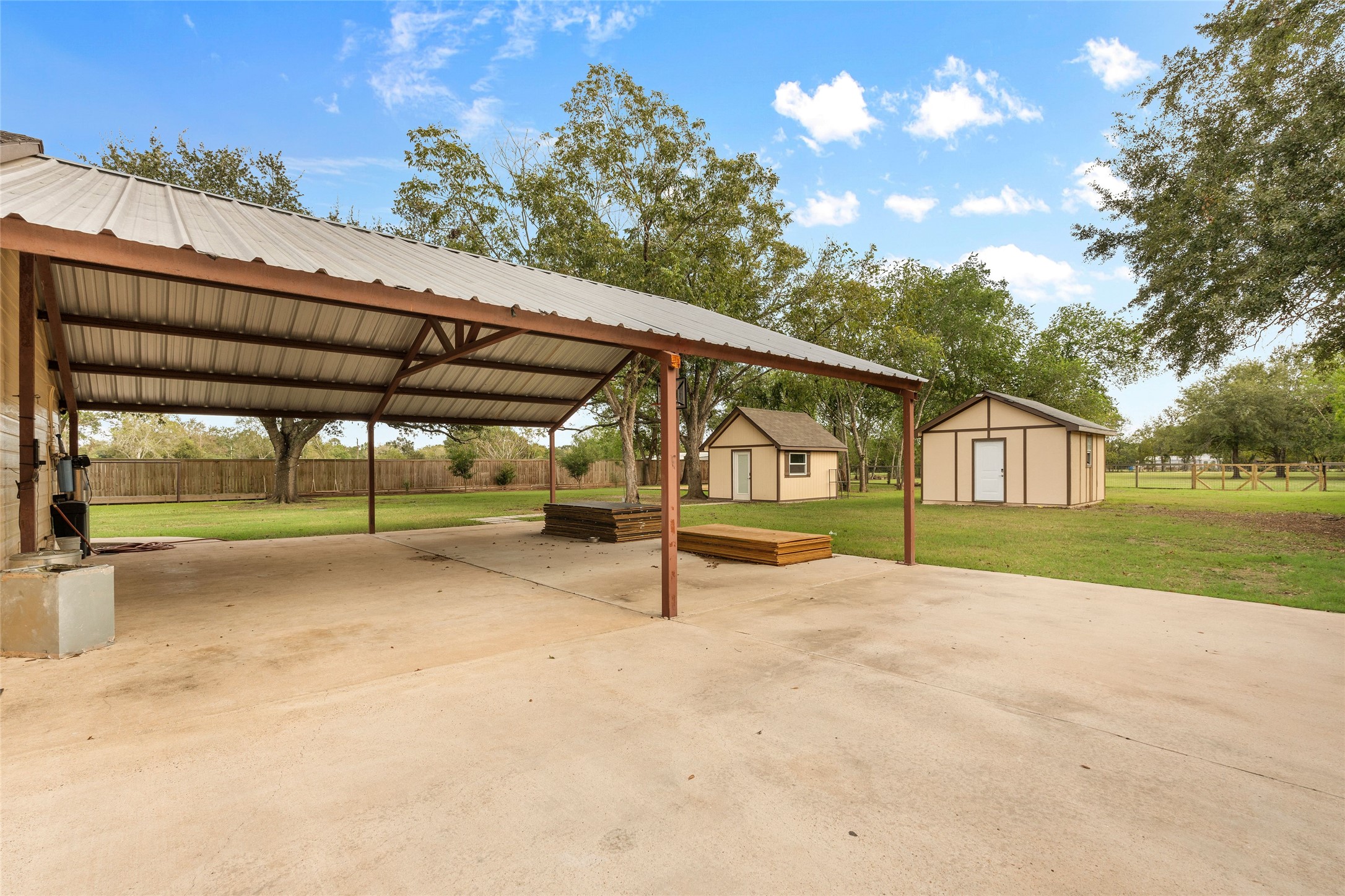 1022 Brooks Avenue Rosenberg, TX 77471 - Photo 25 of 36 a view of a house with backyard and tree