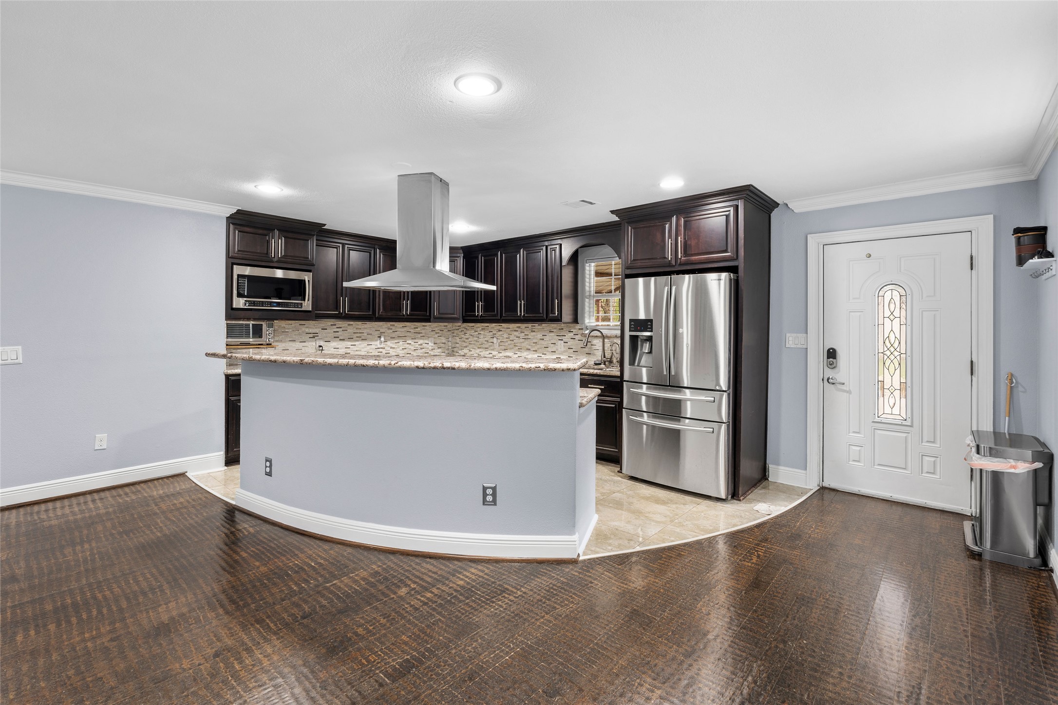1022 Brooks Avenue Rosenberg, TX 77471 - Photo 4 of 36 a kitchen with stainless steel appliances granite countertop a refrigerator and a stove