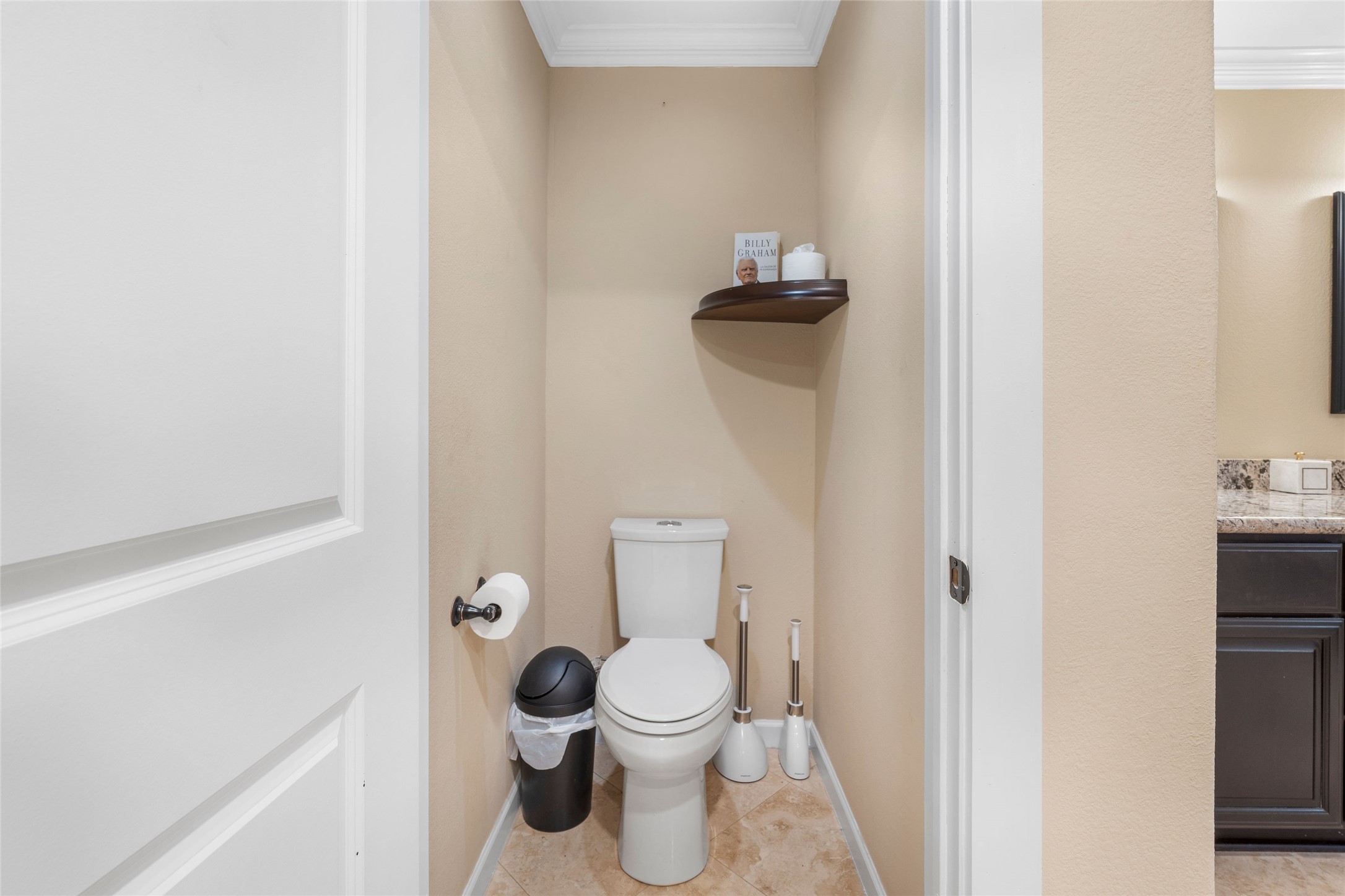1022 Brooks Avenue Rosenberg, TX 77471 - Photo 6 of 36 a white toilet sitting next to a bathroom sink