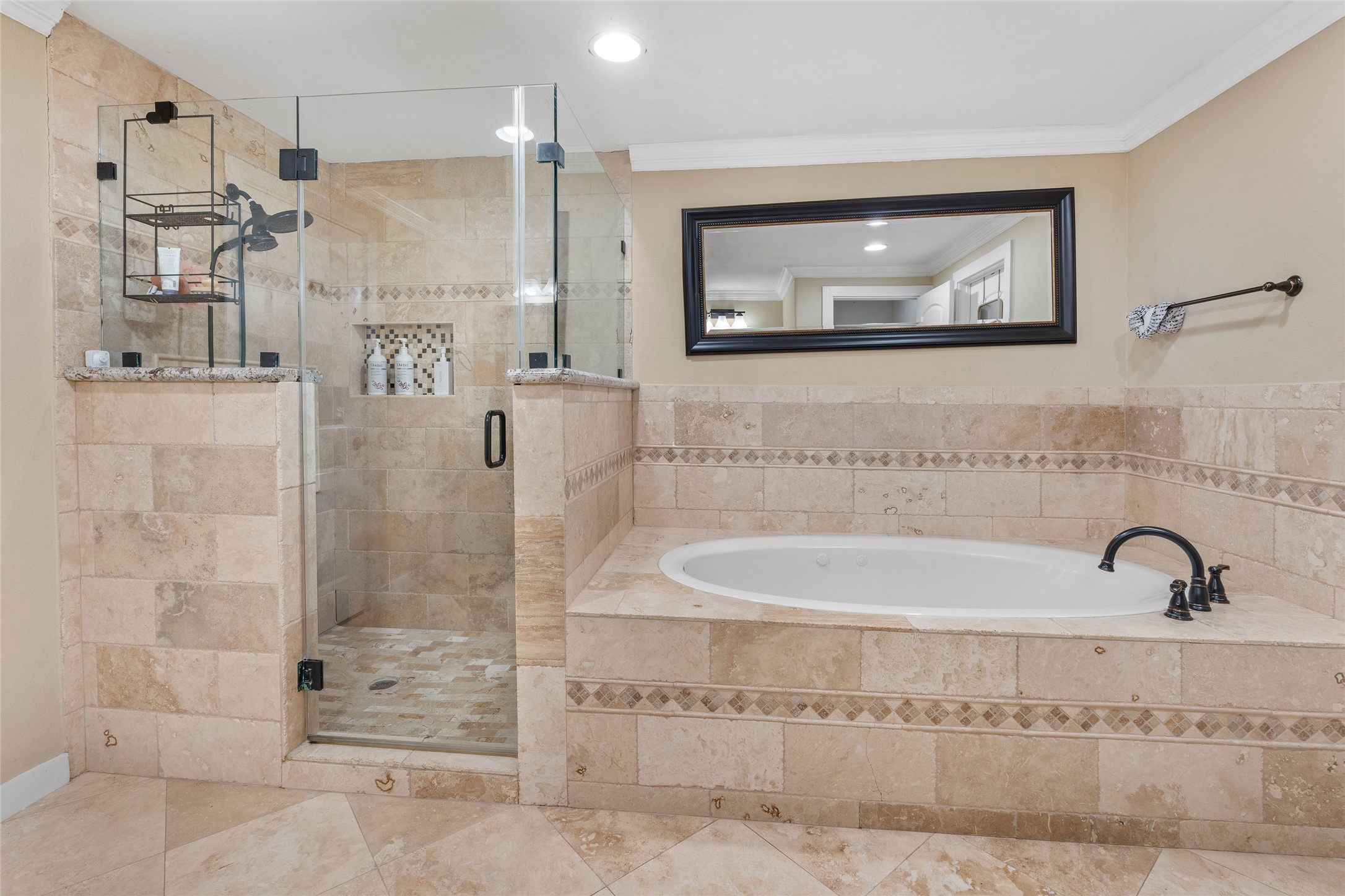 1022 Brooks Avenue Rosenberg, TX 77471 - Photo 7 of 36 a bathroom with a bathtub and a shower