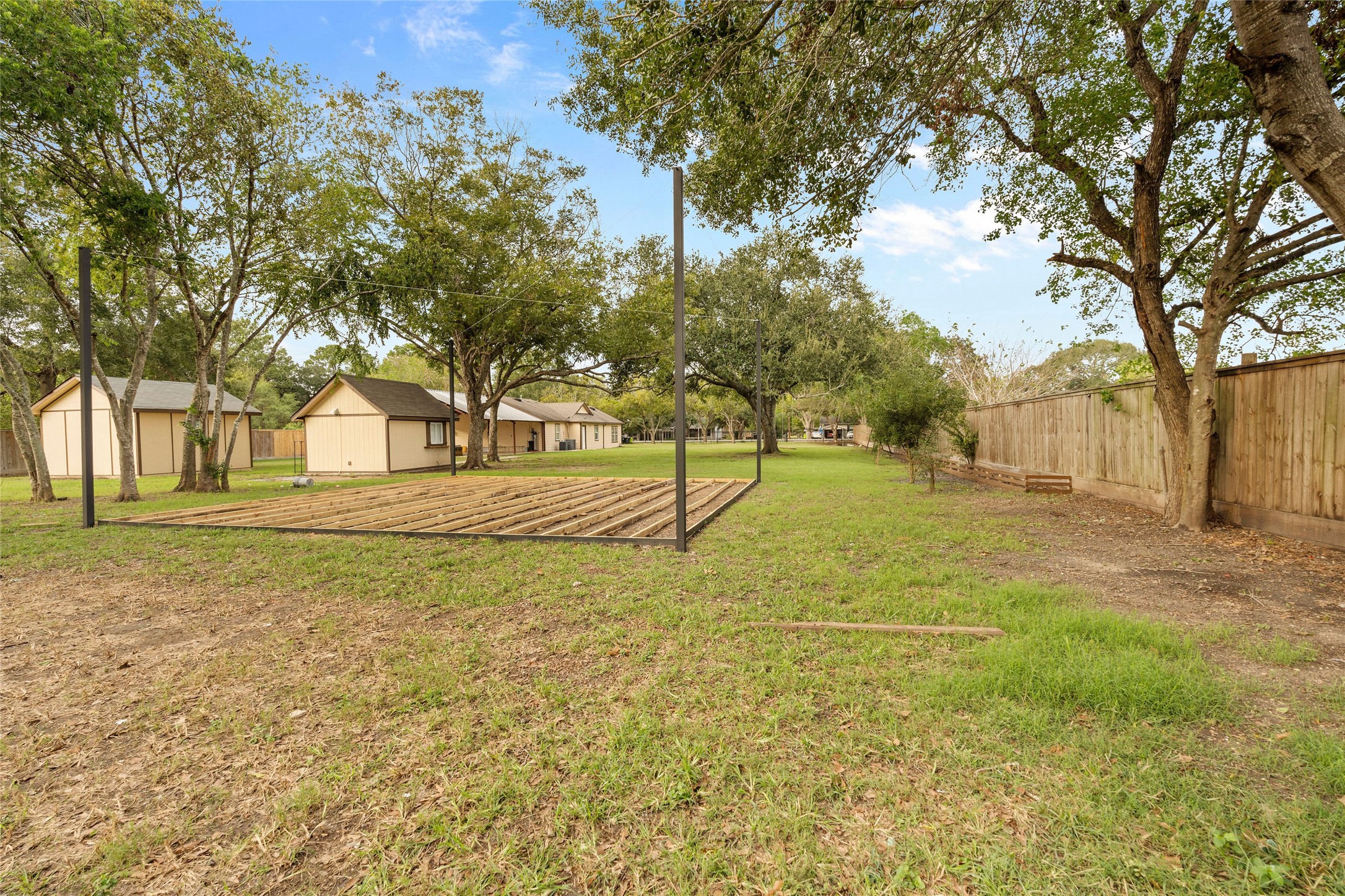 1022 Brooks Avenue Rosenberg, TX 77471 - Photo 9 of 36 a view of swimming pool with trees