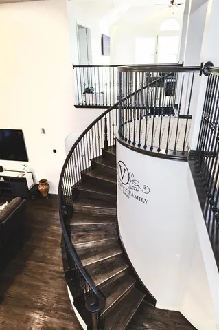 a bedroom with a bed and a table with chair