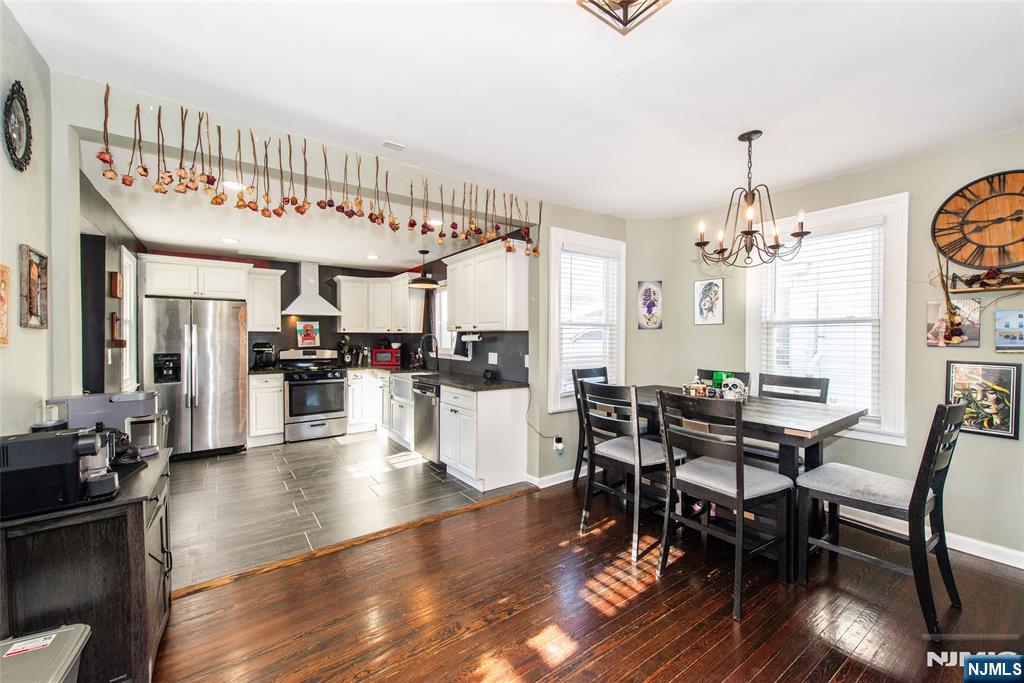 405 Washington Street Boonton, NJ 07005 - Photo 21 of 26 a view of a dining room with furniture and wooden floor