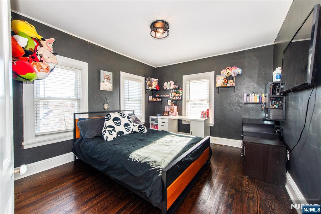 405 Washington Street Boonton, NJ 07005 - Photo 25 of 26 a living room with stainless steel appliances granite countertop furniture and a flat screen tv